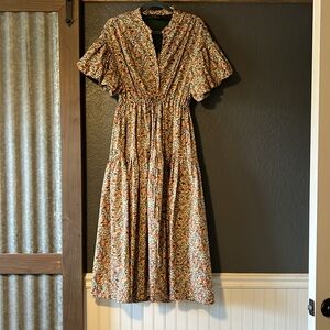 Floral dress with attached slip.cute semi puff sleeves. Only worn 1x.